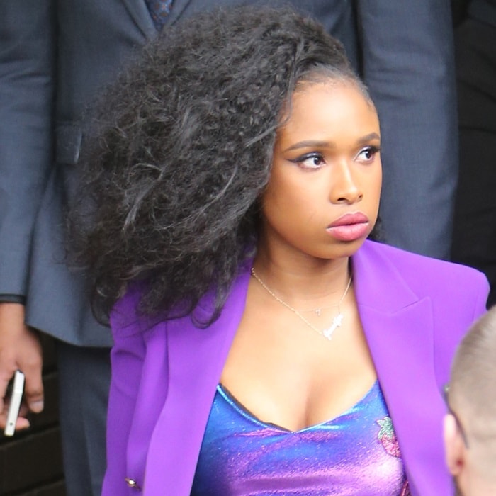 Jennifer Hudson styled her curled black hair into a wild one-sided look