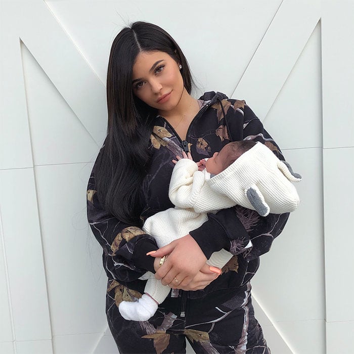 Kylie Jenner's Instagram post of her cradling her one-month-old baby daughter Stormi.