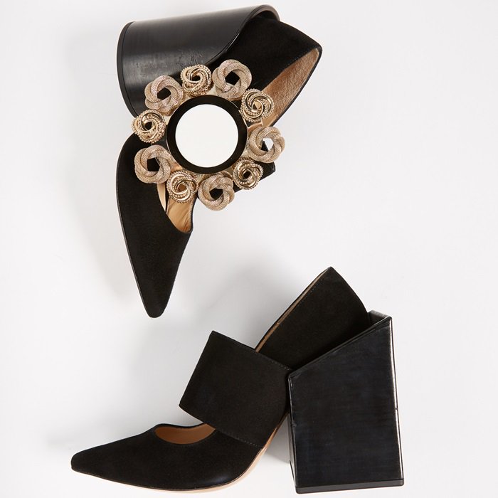 Oversized square and circle heels add a playful, bold aesthetic to these pointed-toe pumps