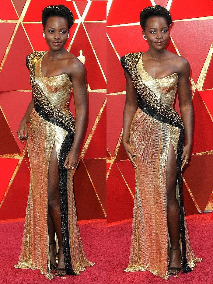 Lupita Nyong'o in an Atelier Versace metallic gown and Alexandre Birman sandals at the 2018 Oscars.