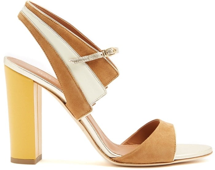 The yellow leather-covered block heel of Malone Souliers' tan-brown sandals gives them a spring-ready slant