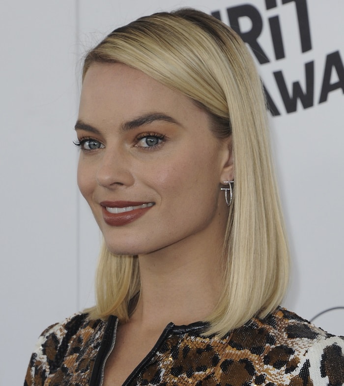 Margot Robbie accessorized with Tiffany T jewelry