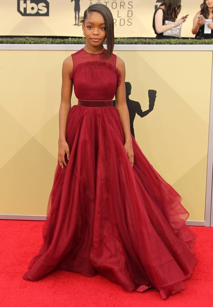 Marsai Martin radiates elegance in a flowing crimson Miri Couture gown on the red carpet at the 2018 SAG Awards
