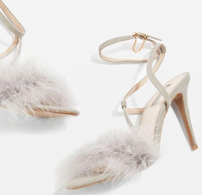 When it comes to heels, think textured and stylish with Topshop's feathered front strap sandals in grey.