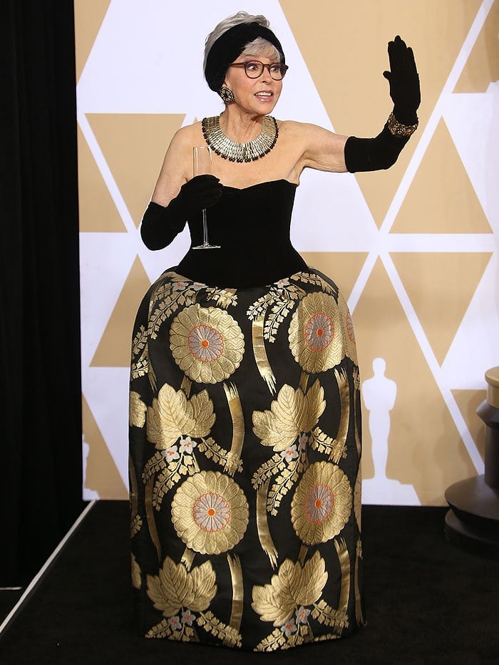 Rita Moreno wearing the same gown she wore to the 1962 Oscars.