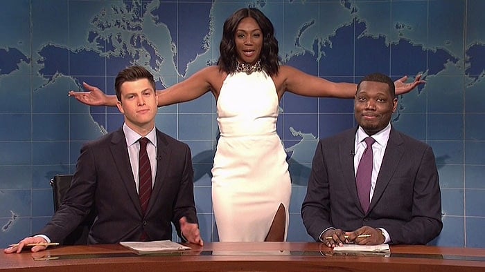 Tiffany Haddish appearing again in her white McQueen dress during a segment of her "Saturday Night Live" guest appearance that aired on November 12, 2017.