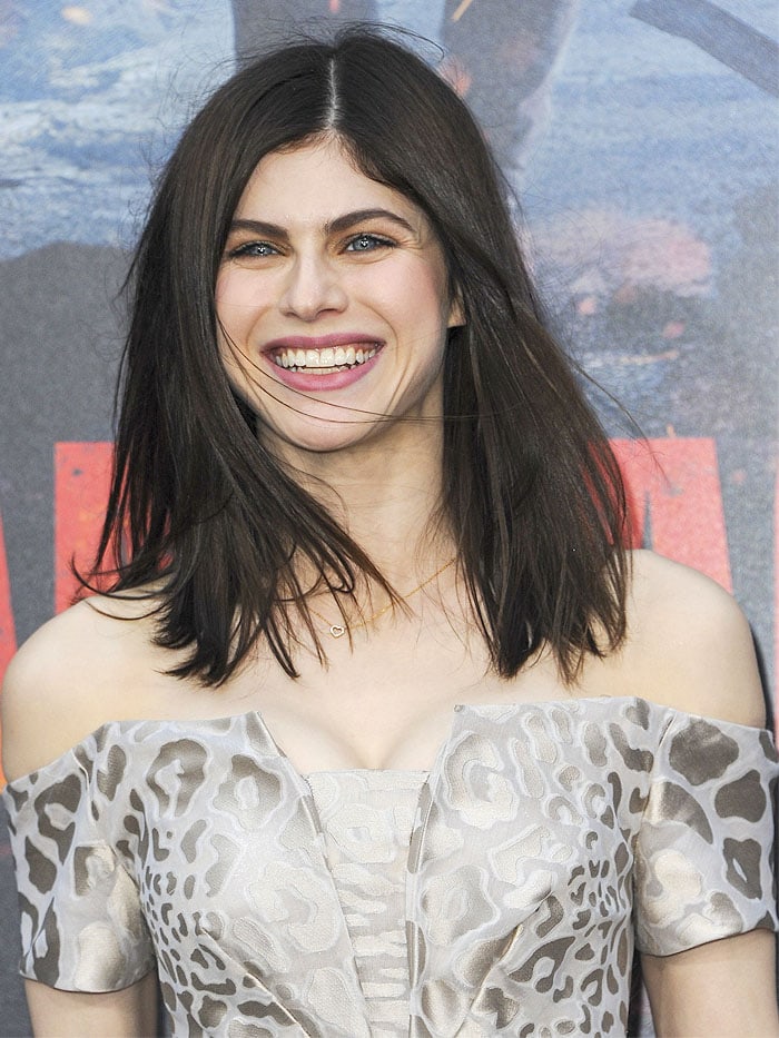 Alexandra Daddario smiling at the "Rampage" LA premiere.