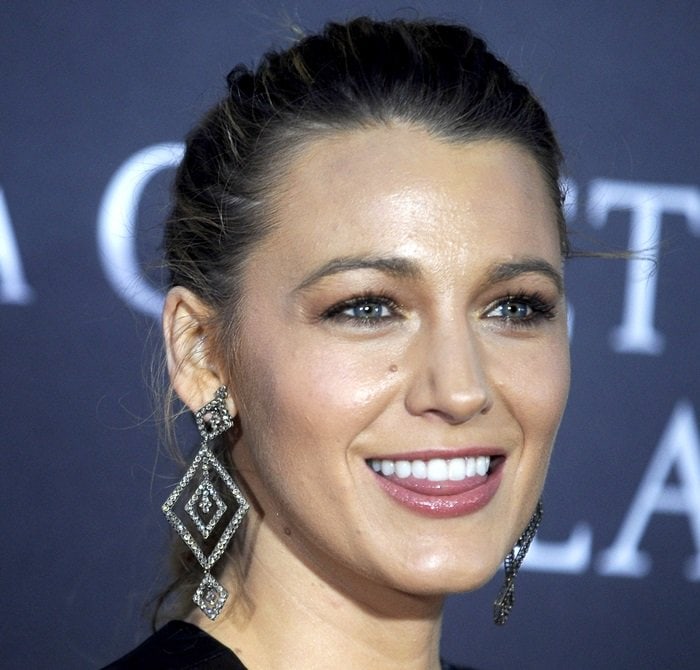 Blake Lively showing off her large Ofira pendant earrings