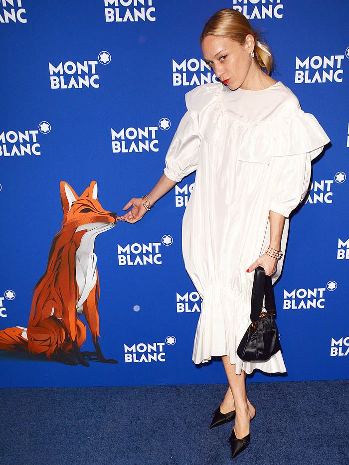 Chloe Sevigny wearing her Balenciaga 'Knife' satin mules at the 75th Anniversary of Le Petit Prince hosted by Montblanc event,