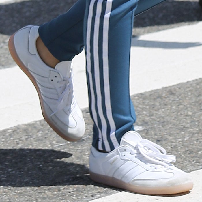 Closeup of Emily Ratajkowski's Adidas 'Samba' sneakers.