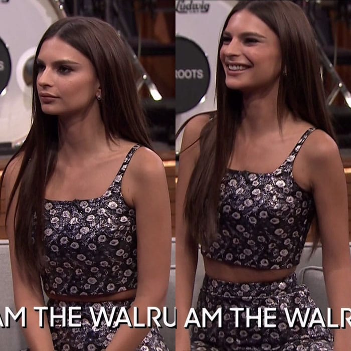 Emily Ratajkowski appears on The Tonight Show Starring Jimmy Fallon, wearing a chic floral-print crop top and matching high-waist pants while playing a game of charades