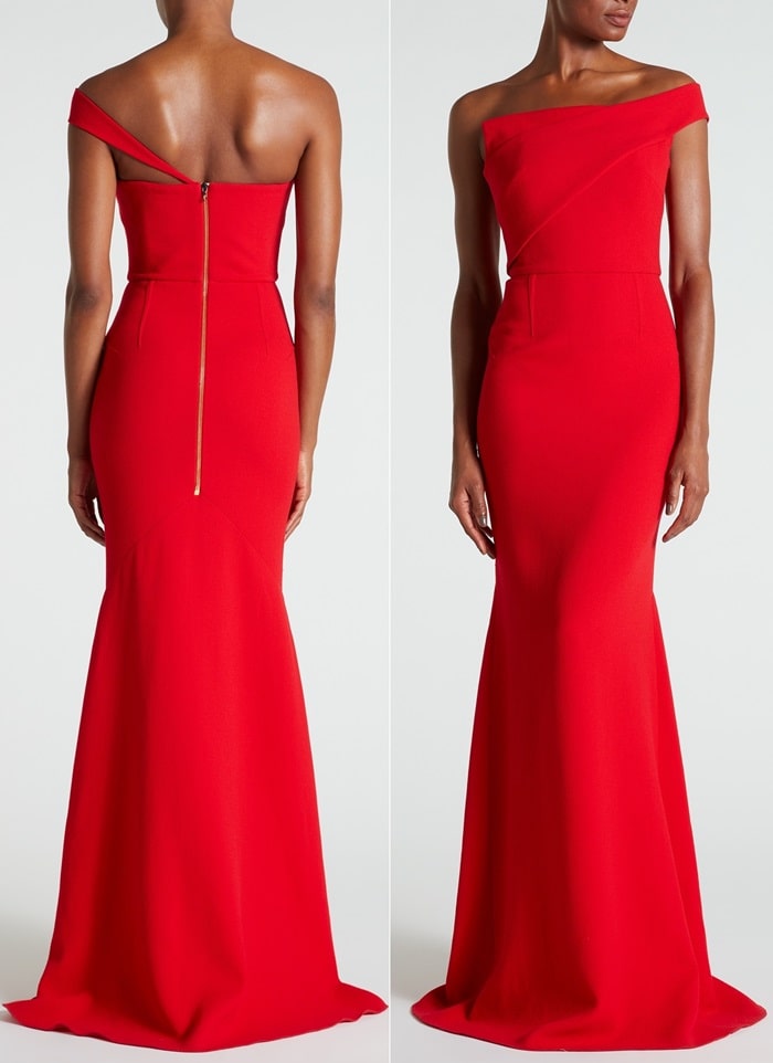 The 'Lockton' gown in poppy red double wool crepe marries up a strapless bodice with a single, tapered strap that dips low on one shoulder and wraps around the back to meet a polished gold zip
