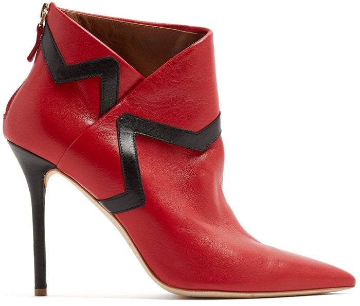 These red booties crafted from leather to asymmetrically encase the ankle