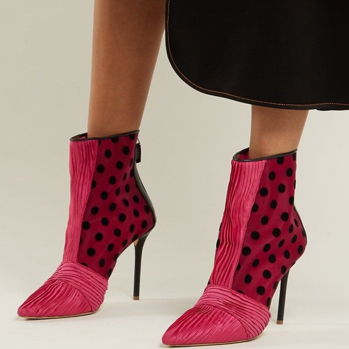 These hot-pink mesh boots feature the couture house’s signature polka-dots in black
