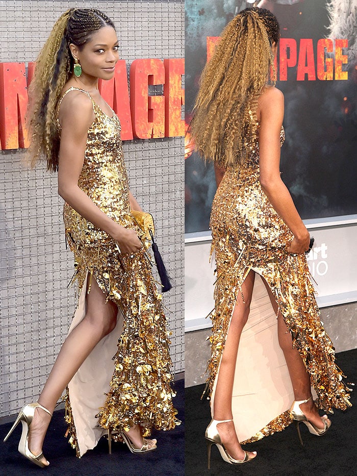 Naomie Harris wearing Jimmy Choo gold ankle-strap sandals with a Miu Miu gold sequined dress.