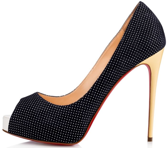 This peep-toe pump in navy and white polka dot suede makes a charming statement