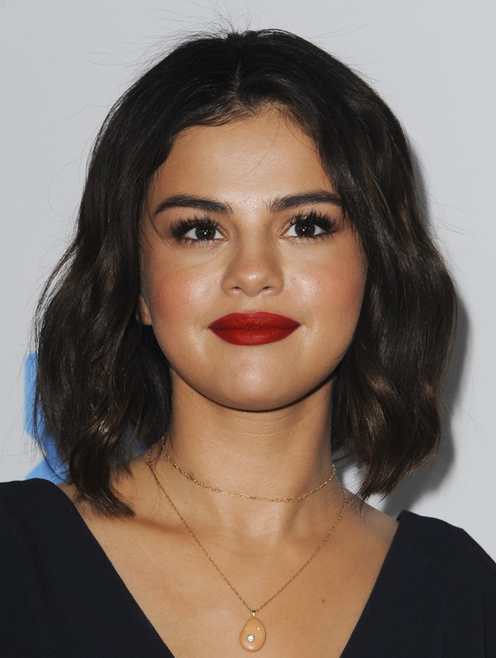 Selena Gomez showcased a chic bob hairstyle and a delicate teardrop pendant necklace at WE Day California