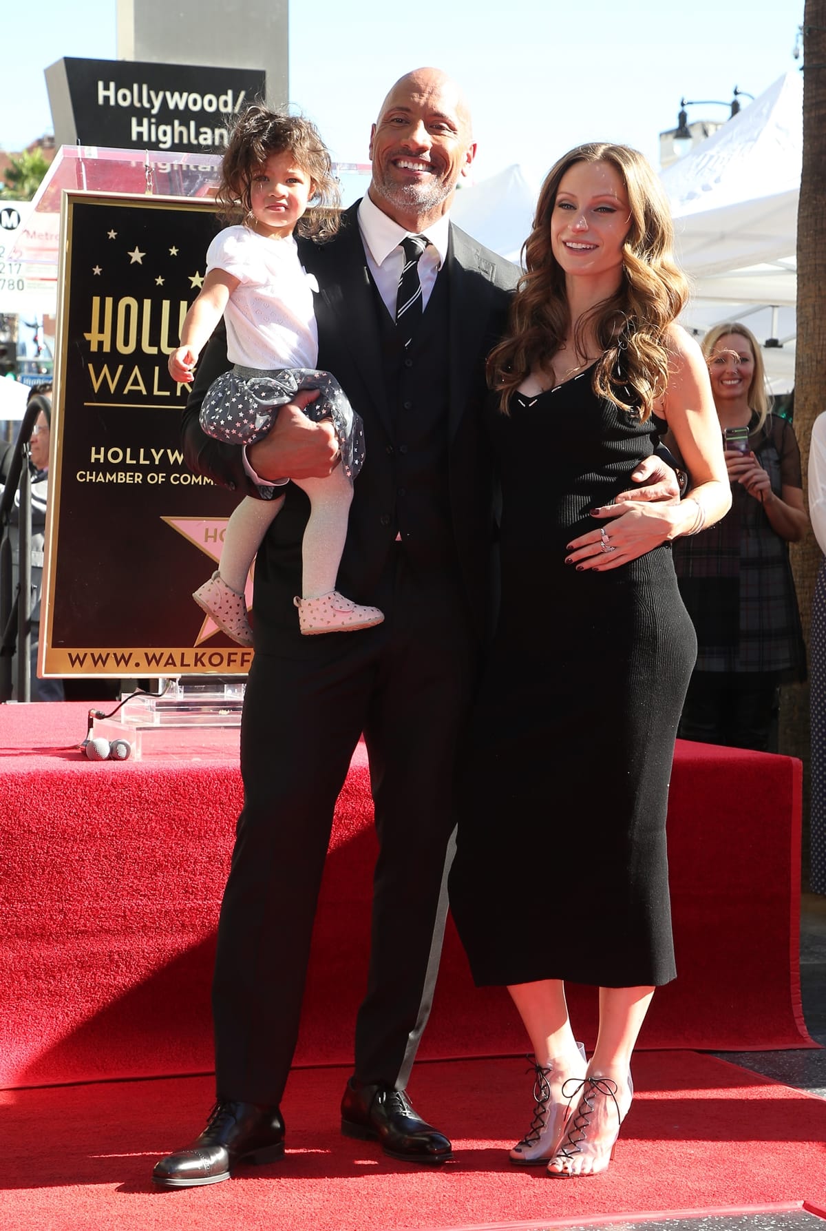 Dwayne “The Rock” Johnson celebrates his star on the Hollywood Walk of Fame with his pregnant girlfriend Lauren Hashian and their 1-year-old daughter Jasmine