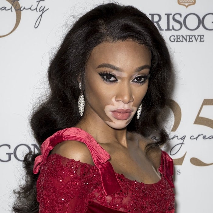 Winnie Harlow in a breathtaking red embellished peplum gown from Elie Saab