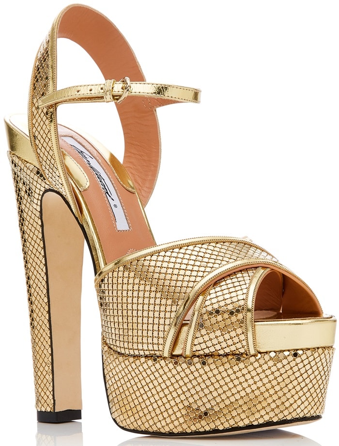 This sandal is rendered in specchio leather and features a metallic finish and platform detail