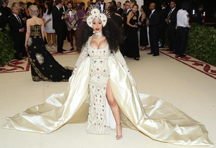 Cardi B wearing a Moschino by Jeremy Scott bejeweled floor-length dress