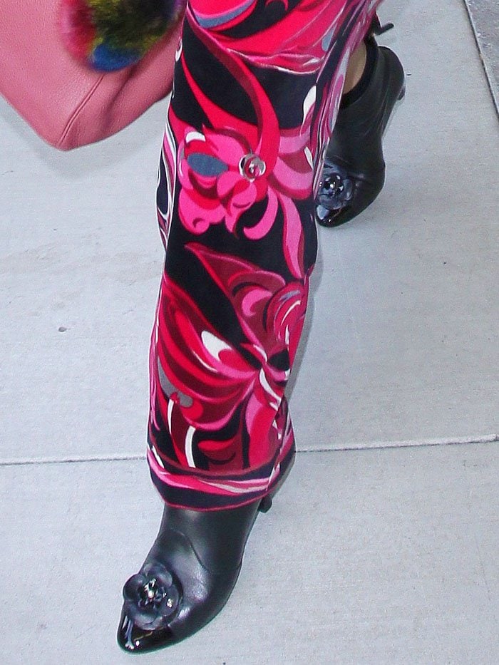 Closeup of Catherine Zeta-Jones' Chanel flower-toe ankle boots.