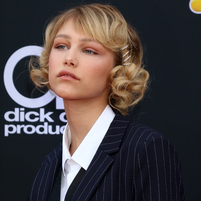 Grace VanderWaal styled her short pin-curled bob with elegant pearl bobby pins, adding a vintage-inspired touch to her polished red carpet look