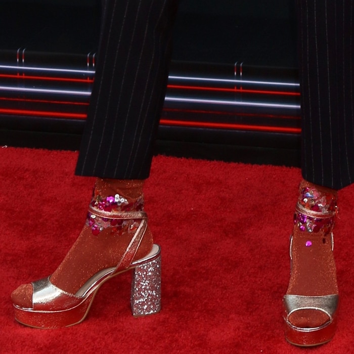 Grace VanderWaal made a bold style statement by pairing glittering Chinese Laundry 'Tayla' platform sandals with playful sheer socks embellished with pink sequins
