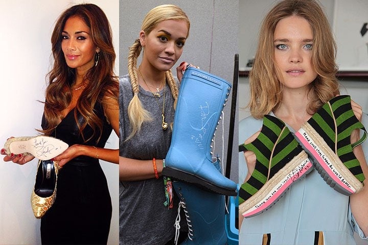 Nicole Scherzinger, Rita Ora, and Natalia Vodianova with their autographed shoe donations to the Small Steps Project celebrity shoe auction.