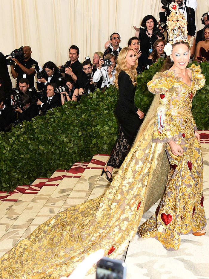 Sarah Jessica Parker in Dolce & Gabbana Alta Moda gold-filigree gown and metallic-copper platform sandals.