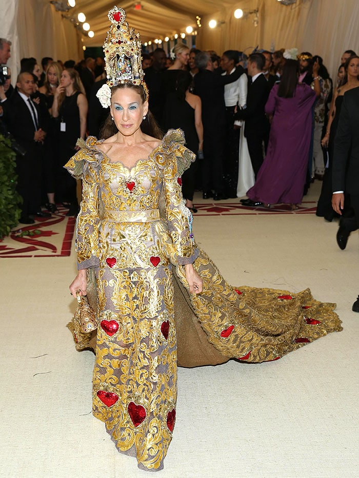 Sarah Jessica Parker in a Dolce & Gabbana Alta Moda gold baroque heart-embellished gown and nativity altar headpiece.