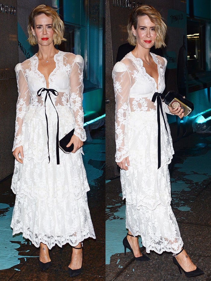 Sarah Paulson wearing a Brock Collection Fall 2018 white-lace long-sleeve dress