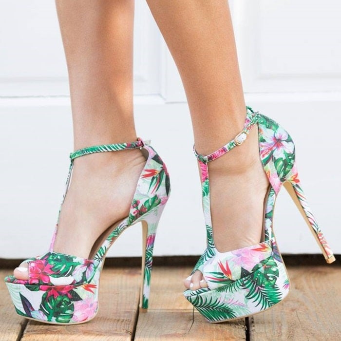 Sexy t-strap platform stiletto pump with peep toe, tropical floral embellishment, and adjustable buckle