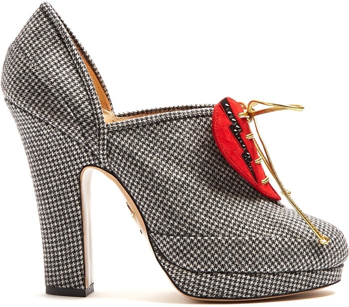 Stand out in Charlotte Olympia's black and white hound’s-tooth Leading Lady pumps.