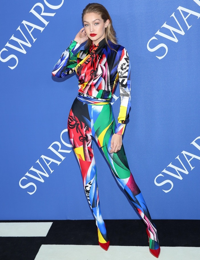 Gigi Hadid in a multicolored graphic brushstroke print Versace Fall 2018 jumpsuit