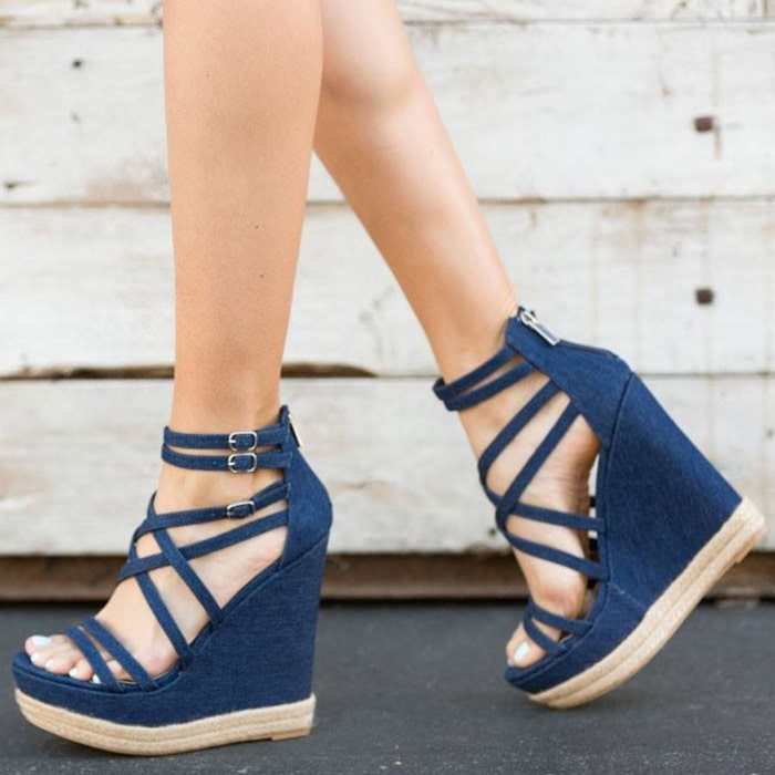 Sexy strappy caged high platform wedge sandal with braided jute detail, functional buckles, and back zip closure