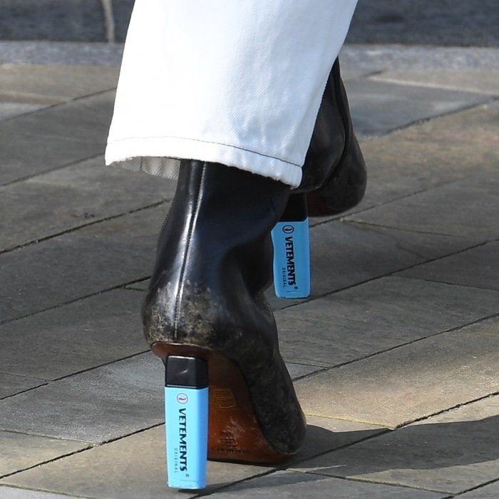 Jess Glynne rocking highlighter-heel leather ankle boots