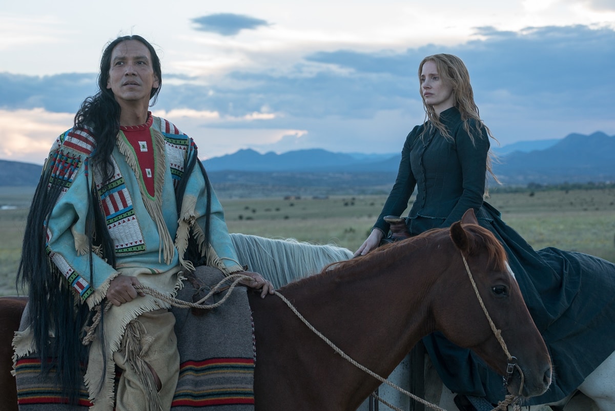 Jessica Chastain as painter Caroline Weldon and Michael Greyeyes as Sitting Bull in the 2017 American biographical drama Western film Woman Walks Ahead