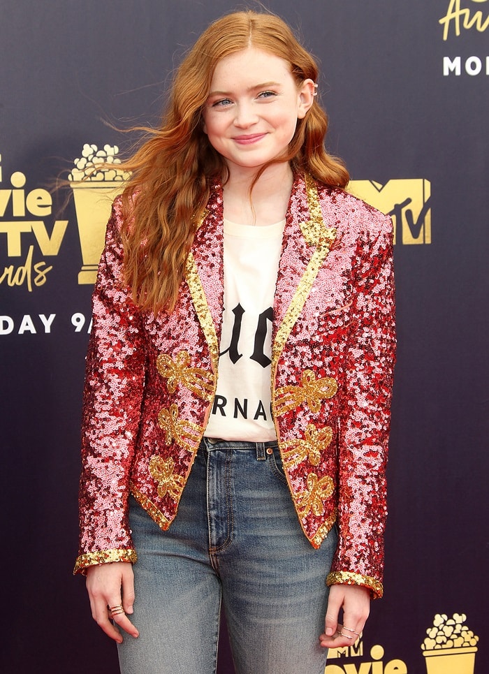 Sadie Sink wore a head-to-toe Gucci look accessorized with Repossi jewelry at the 2018 MTV Movie & TV Awards at Barker Hangar in Santa Monica, California, on June 16, 2018