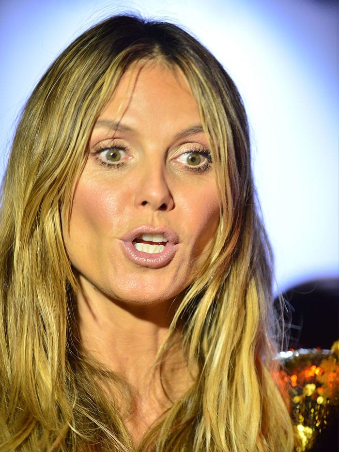Heidi Klum with bedraggled hair and a tan attends Ocean Drive's Magazine's 25th Anniversary Swimsuit Issue Celebration
