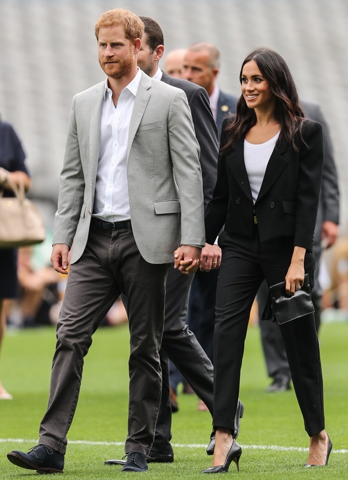 Meghan Markle toting a black goat skin GV3 frame bag from Givenchy