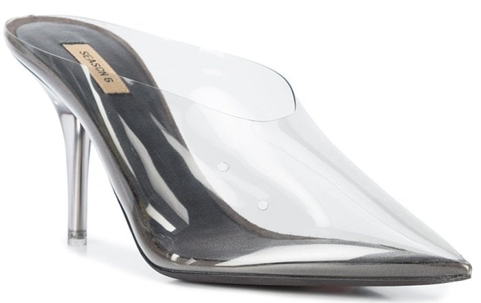 Elegantly constructed from PVC, these impressive statement mules feature a contrasting clear panel, a pointed toe, a leather branded insole, a leather sole, and a clear high heel