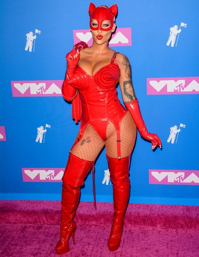 Amber Rose took it to the next level in a latex corset complete with a matching leather whip