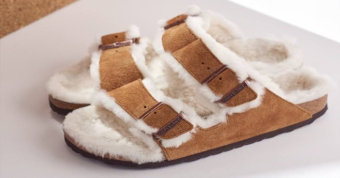 No need for cold toes this season, so cozy up with a classic, the soft Arizona Shearling sandal