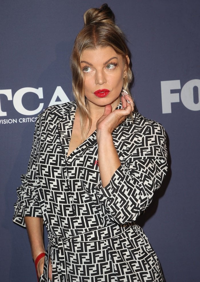 Fergie rocks a Fendi multicolored logo silk jumpsuit at FOX’s 2018 Summer TCAs All-Star Party