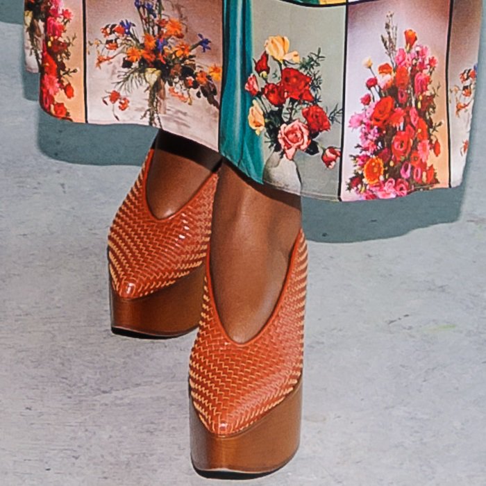 Gabrielle Union wearing rust-colored platform clogs