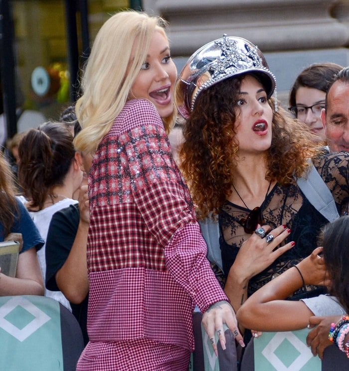 Iggy Azalea looked happy while greeting fans outside the BUILD Series studio ahead of her interview in New York City on August 21, 2018