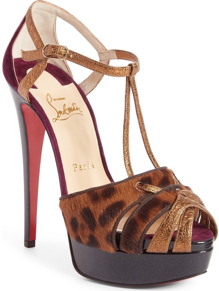 Leopard-printed calf hair mixes with gilded leather and plum-hued suede, tripling the glamorous style of a strappy platform pump set on a soaring stiletto heel and finished with that iconic red sole.