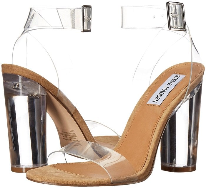 Translucent straps and a towering column heel evoke the delicacy of a glass slipper in this barely-there ankle-strap sandal with standout style
