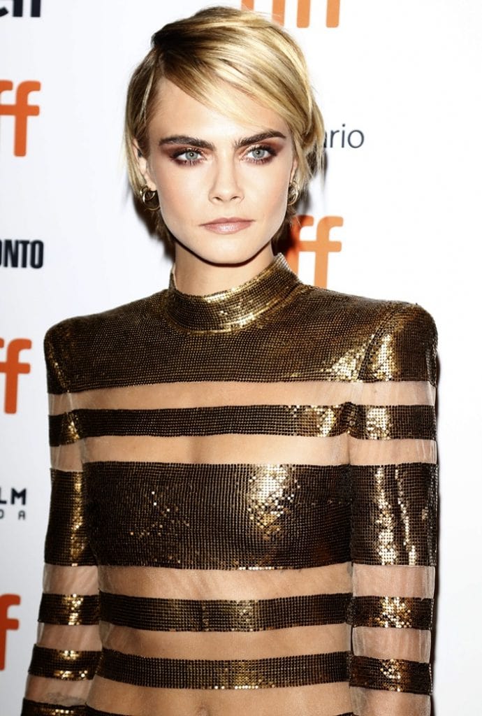 Cara Delevingne Premieres Her Smell in $13,300 Gold Metallic Mini Dress